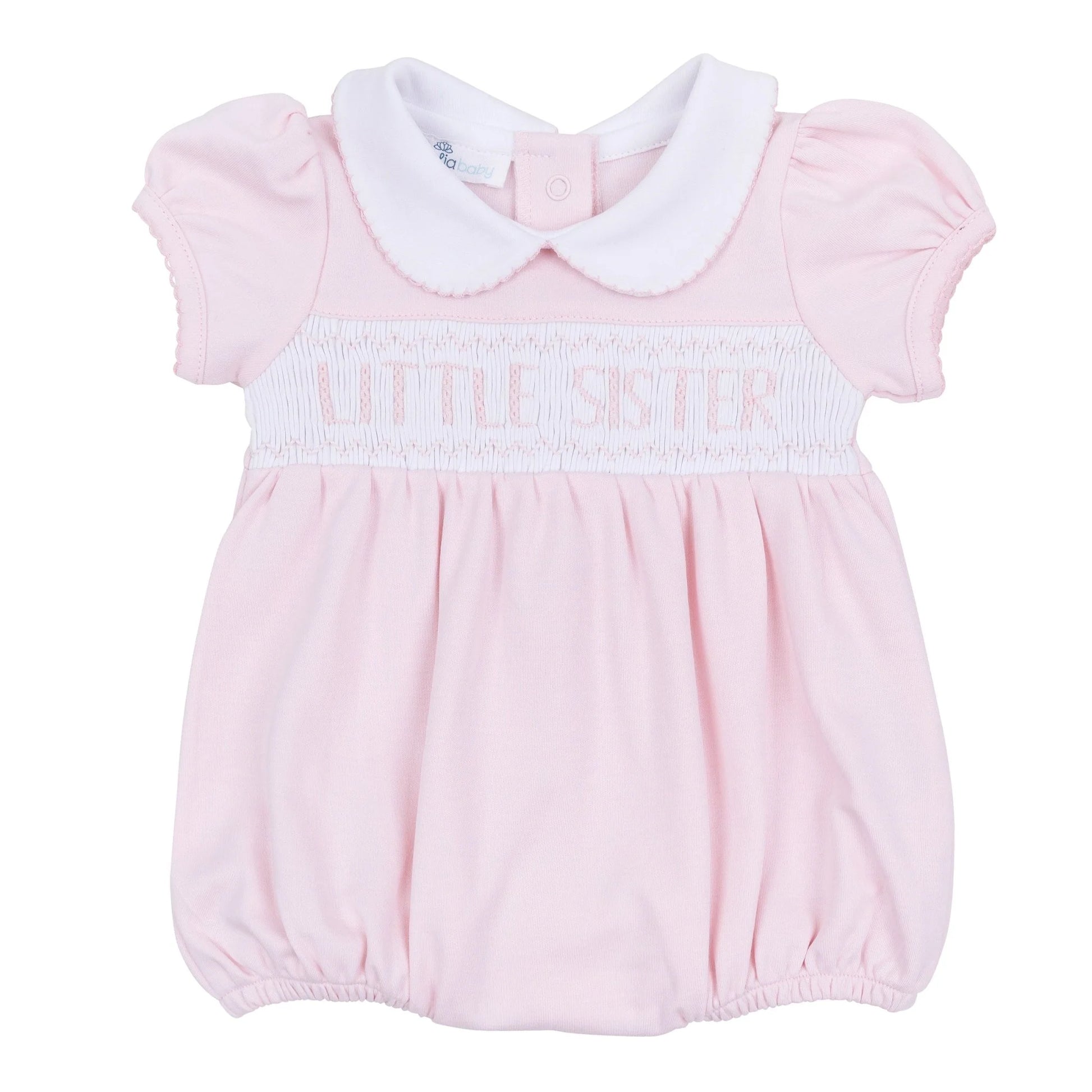 Pink bubble with 'little sister' embroidered on smocking.