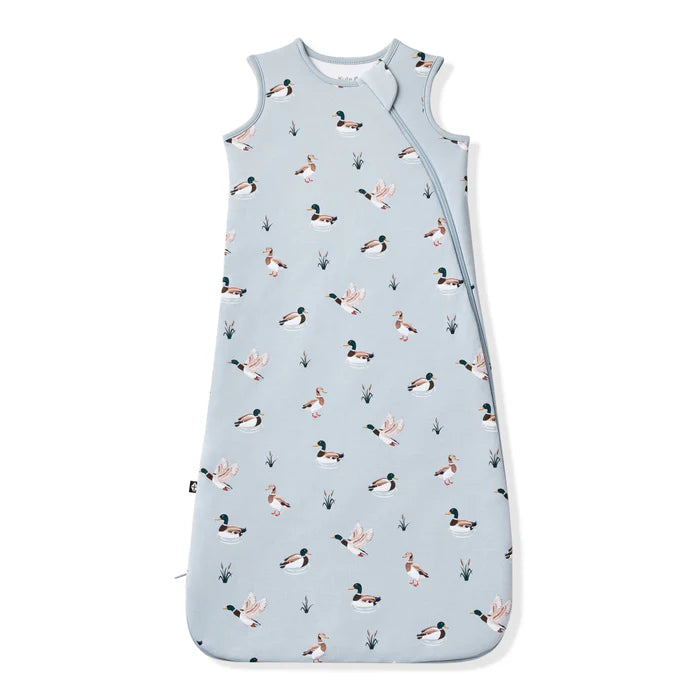 Pale green sleep bag with mallard pattern.
