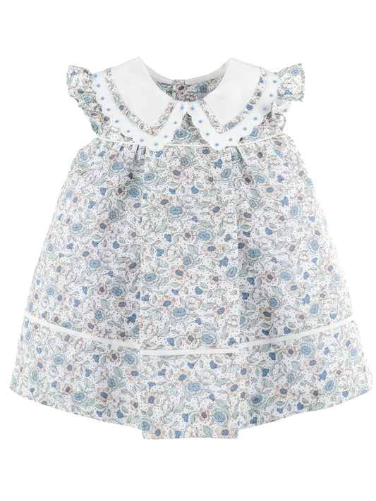 Floral dress with a white collar on a white background
