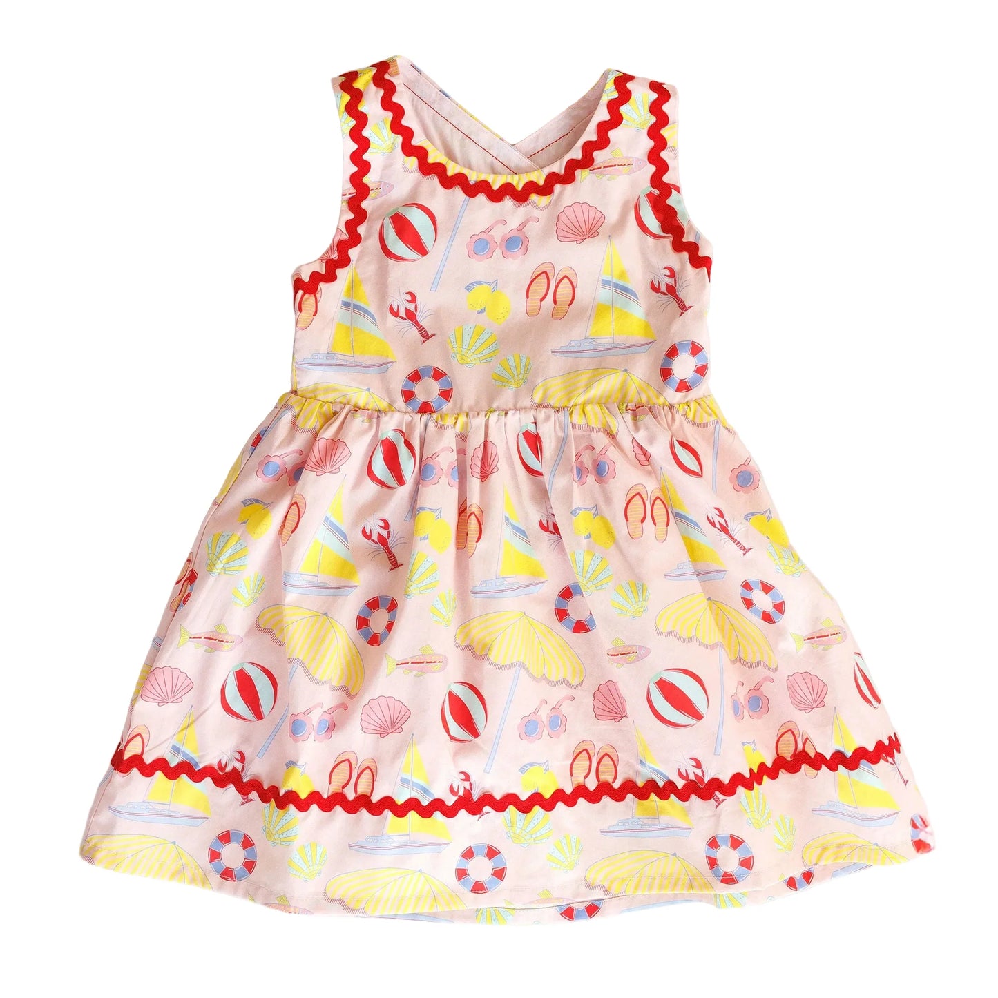 Colorful children's dress with beach-themed print 