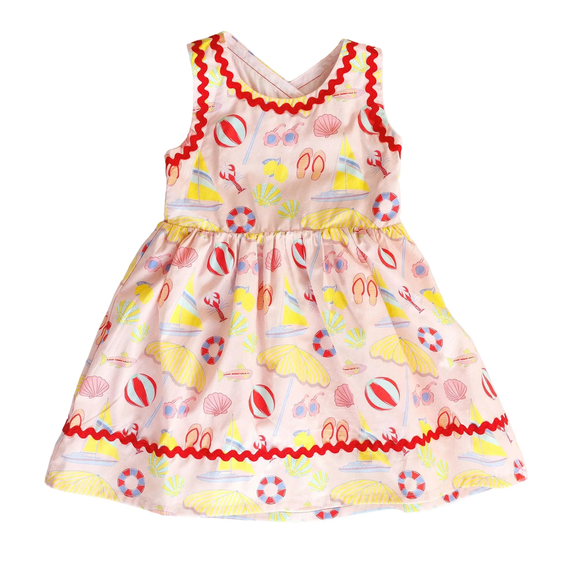 Colorful children's dress with beach-themed print 