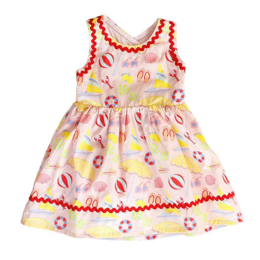 Colorful children's dress with beach-themed print 