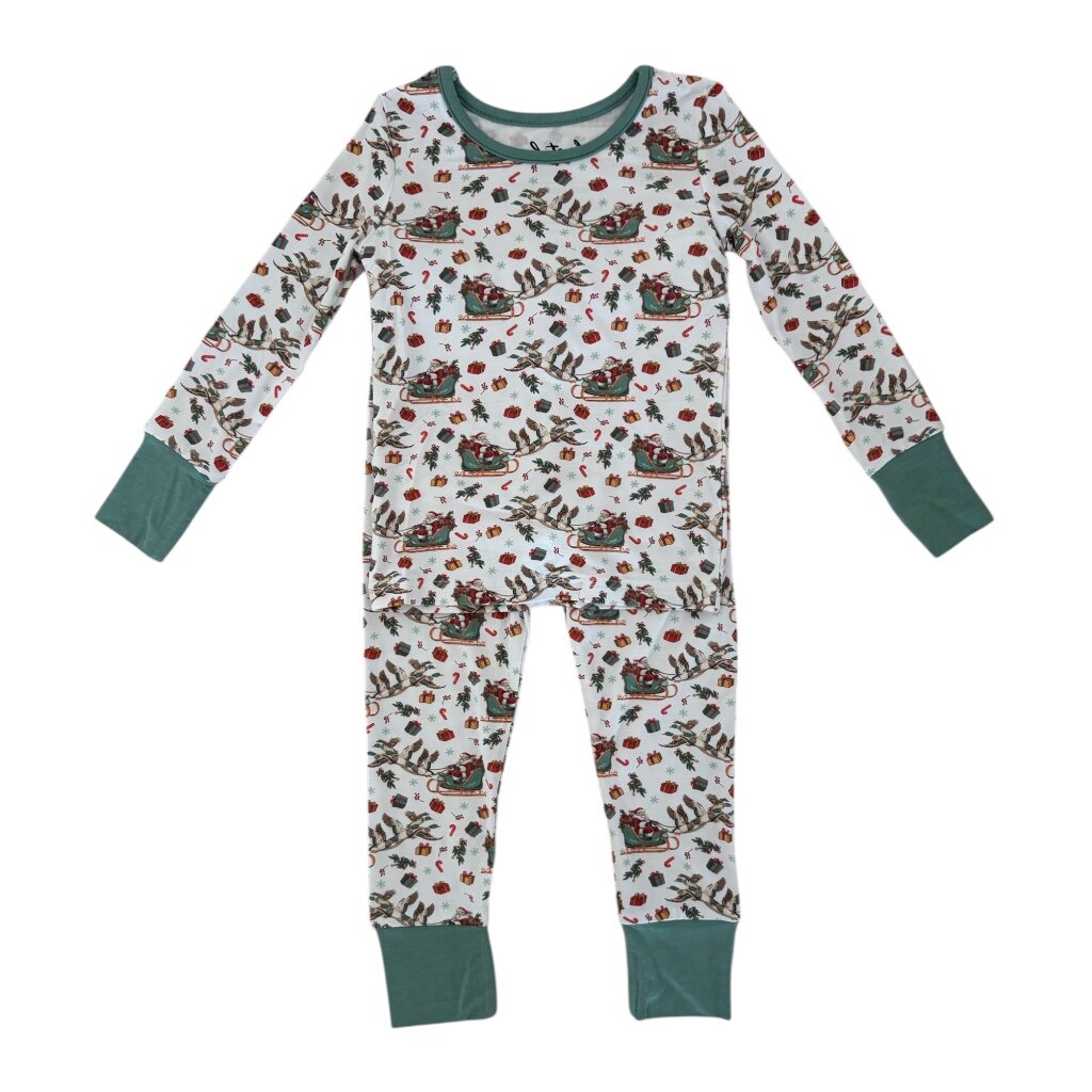 Children's pajama set with festive pattern on a white background