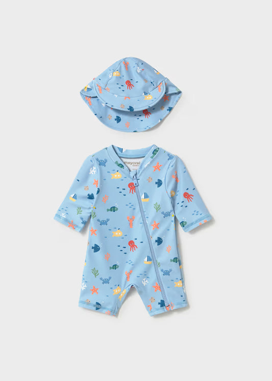 Baby blue one piece swimsuit with matching hat.