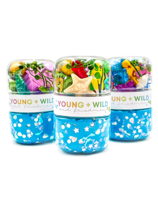 Ocean theme figures with blue dough for sensory play.