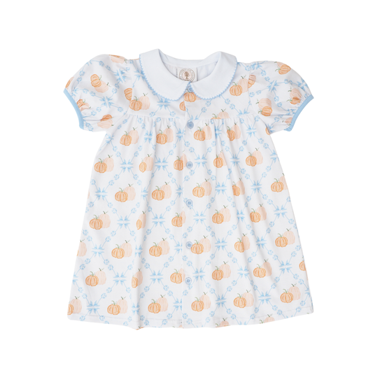 Baby dress with pumpkin and flower pattern on a white background