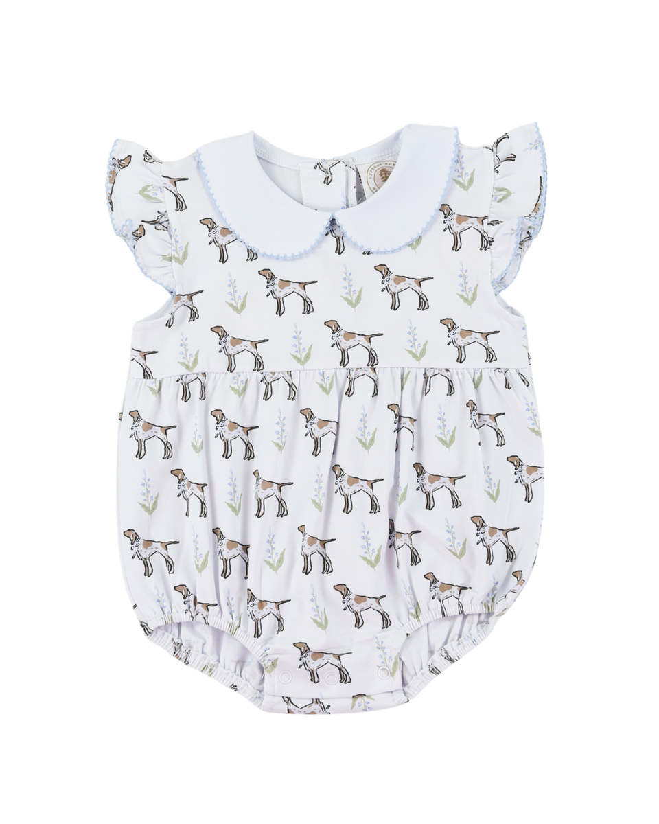 Baby girl bubble with dog pattern with a white collar.