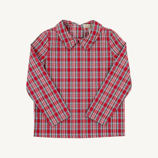 A long-sleeve plaid button-up shirt in red, green, and white, laid flat against a light off-white background.