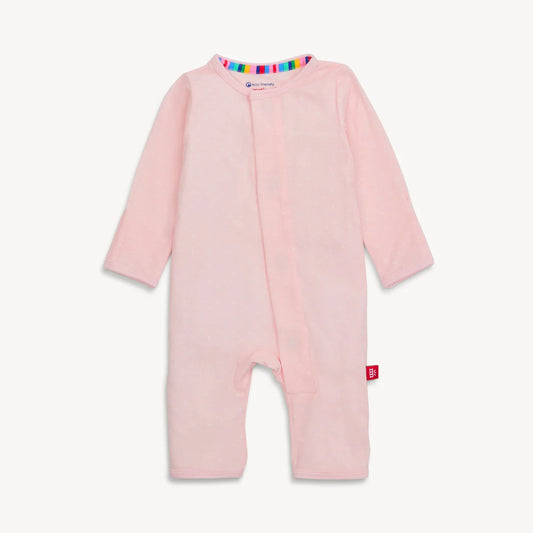 Pink coverall with white dots.