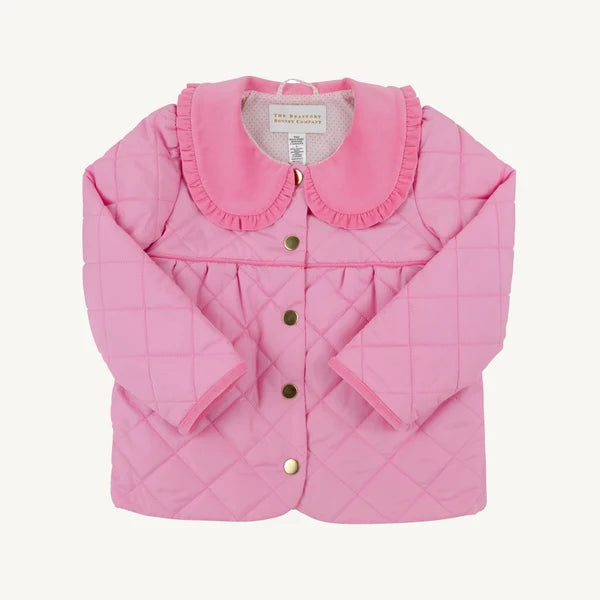 A pink quilted baby jacket with a ruffled Peter Pan collar and gold buttons, laid flat against a light cream background.
