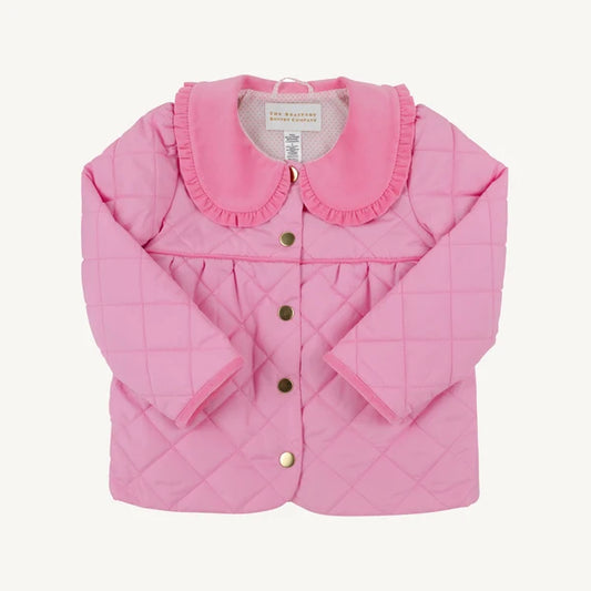 A pink quilted baby jacket with a ruffled Peter Pan collar and gold buttons, laid flat against a light cream background.