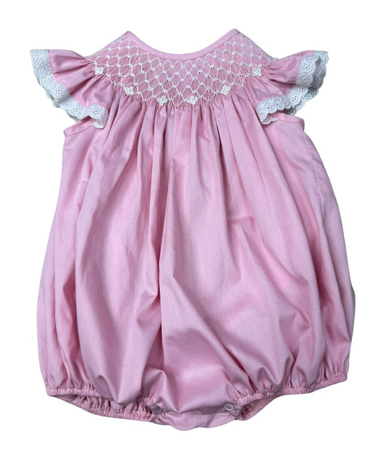 Pink smocked bubble with lace sleeves and pearl detail on smocking.