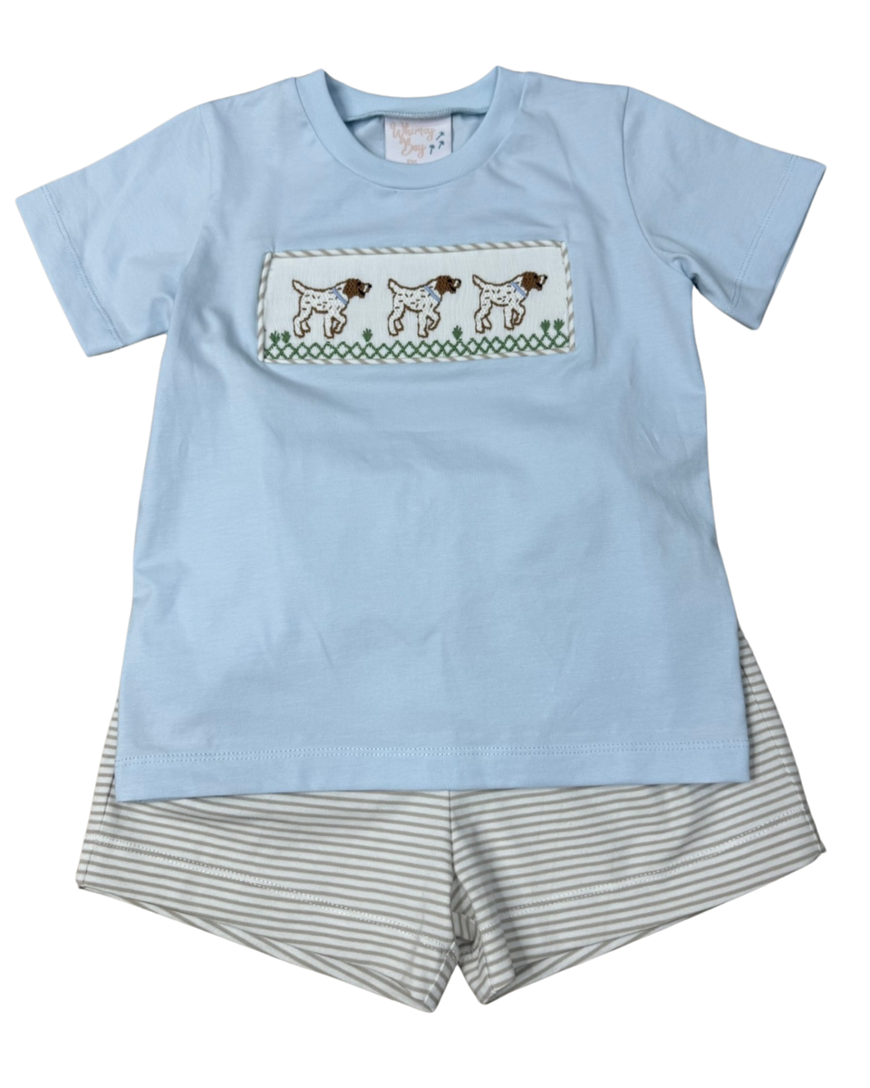 Light blue smocked t-shirt with dog design and striped tan shorts 