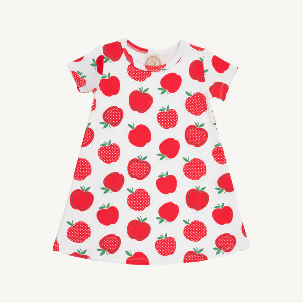 White dress with red apple pattern on a white background