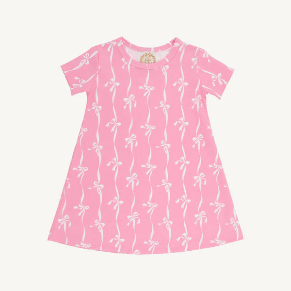 Pink dress with white bow pattern all over