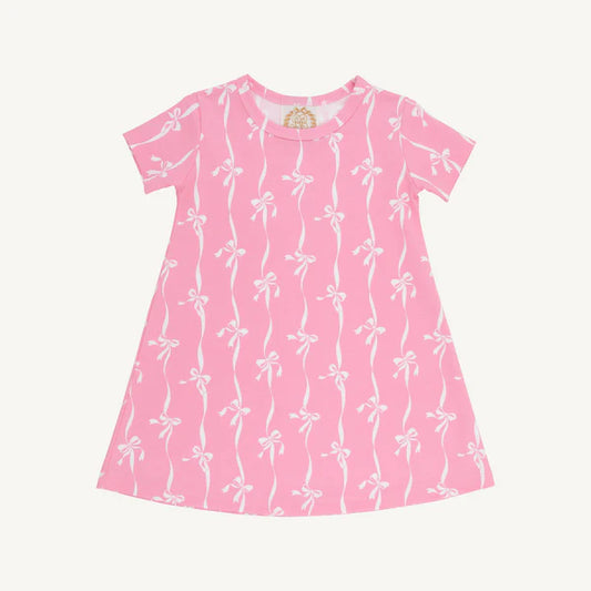 Pink dress with white bow pattern all over
