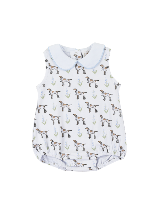 Baby boy romper with dog pattern with a white collar. 