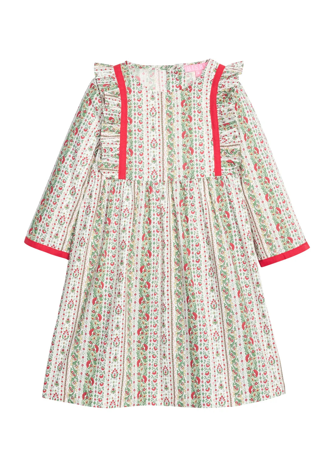 A long-sleeve children's dress with a cream base, green and red floral and paisley print, and bright red trim along the neckline and cuffs.