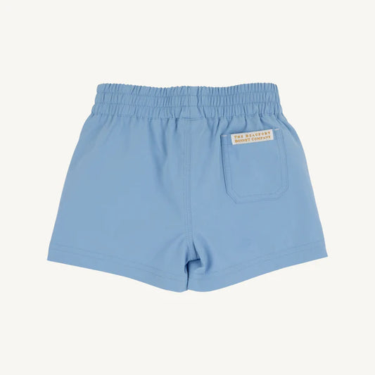 Light blue shorts with a brand label on a white background
