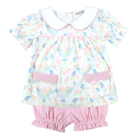 Baby girl's outfit with floral top with white collar and pink trim and matching pink bloomers.