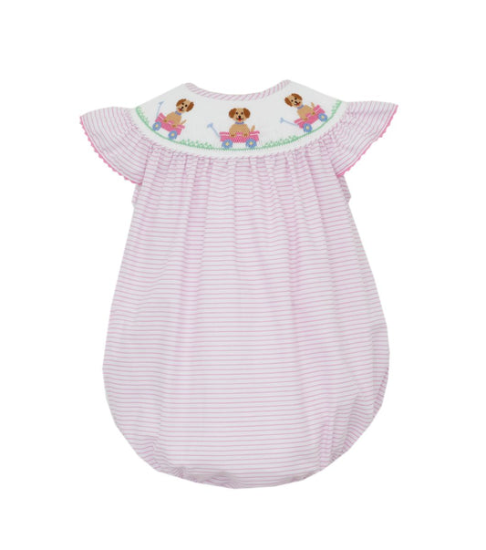 pink and white striped smocked bubble with dog in pink wagon 