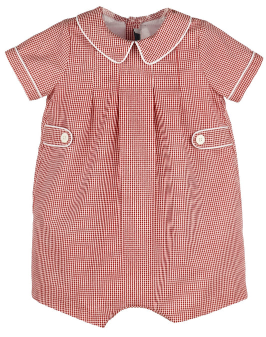 A short-sleeve baby romper in a red and white gingham check pattern, featuring a white Peter Pan collar, white piping details, and two front buttoned pockets.