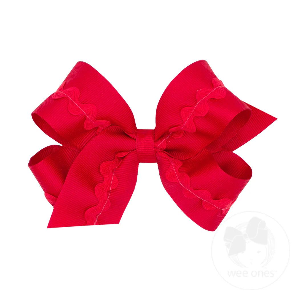Red bow with red rick rack design 