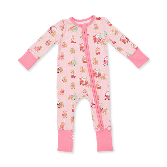 A baby's long-sleeve footless zip-up sleeper in light pink, featuring a festive print of Santa Claus, reindeer, and snowman motifs, with solid pink cuffs and a pink zipper.