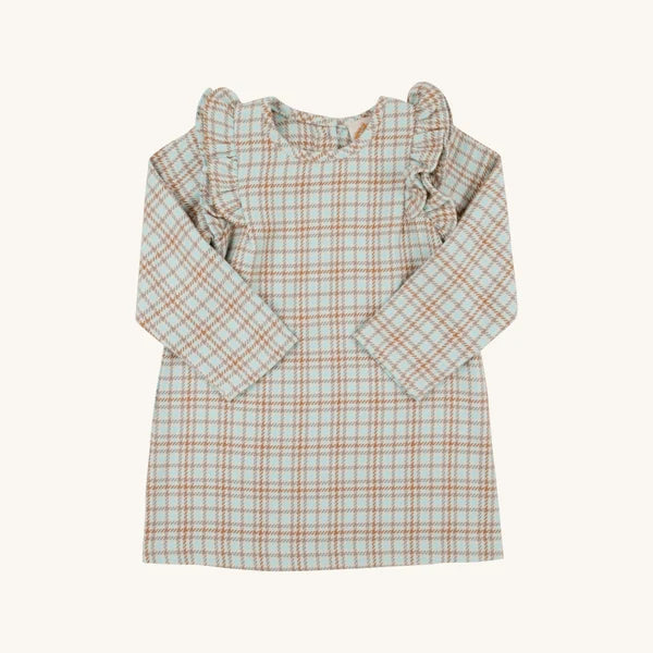 A long-sleeve baby dress with a light blue and beige plaid pattern and ruffled shoulder details, shown flat against a light cream background.
