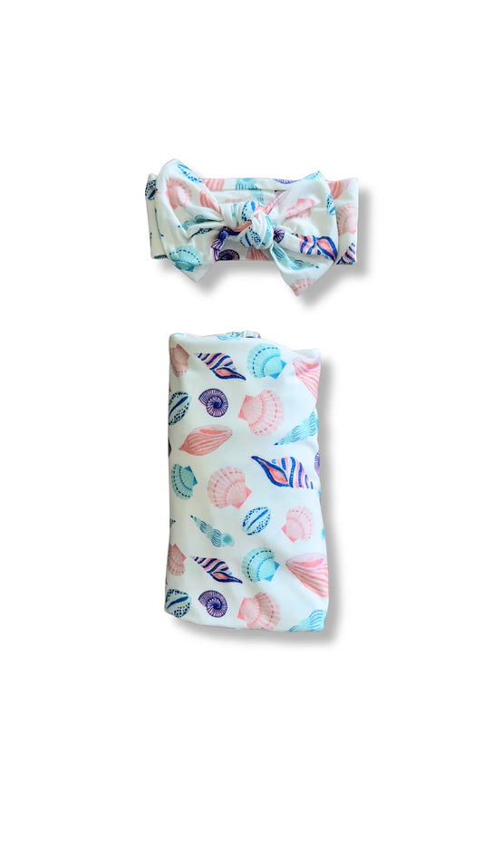 Baby headband and blanket set with colorful shell pattern on a white background