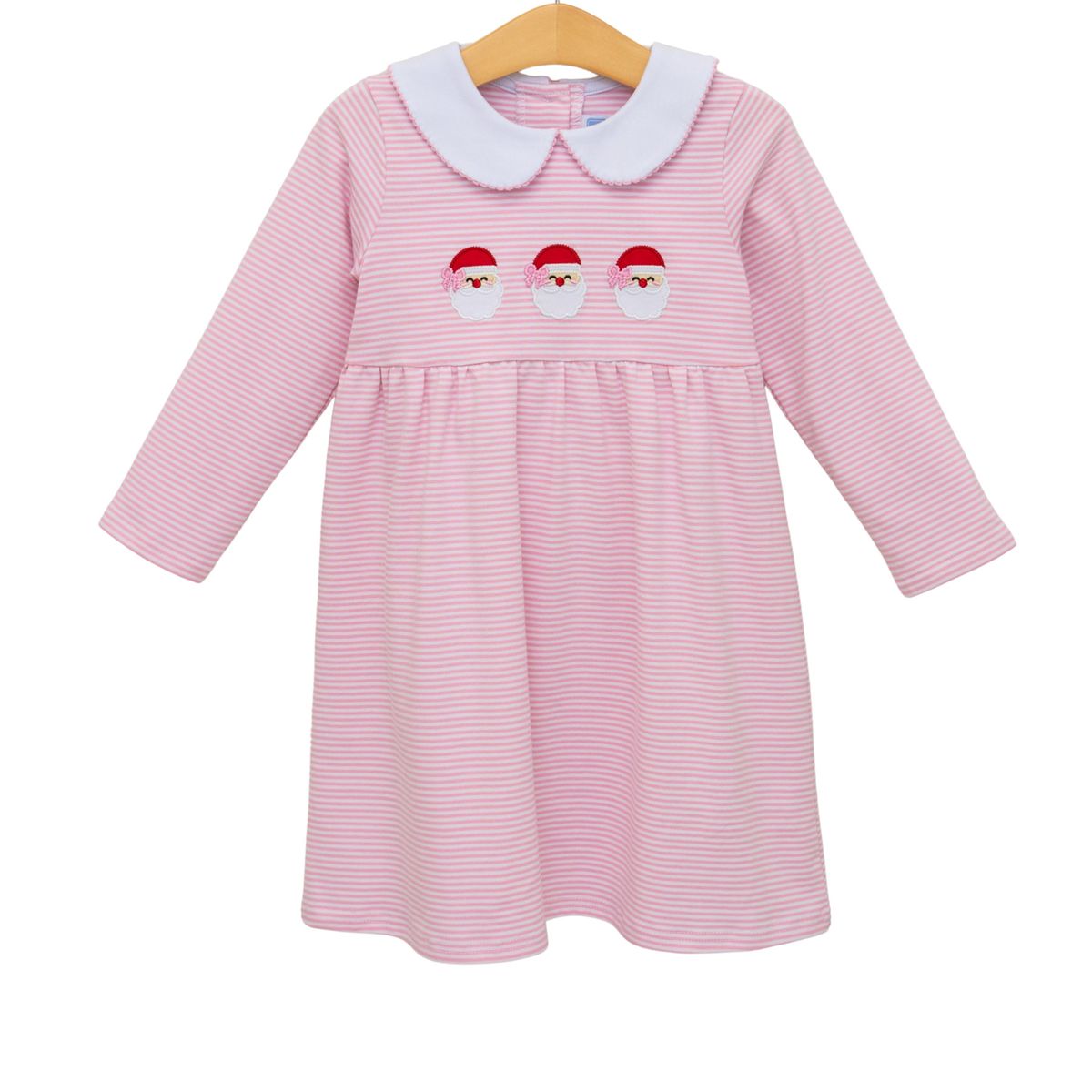 Pink striped dress with white collar and Santa face design on a hanger against a white background