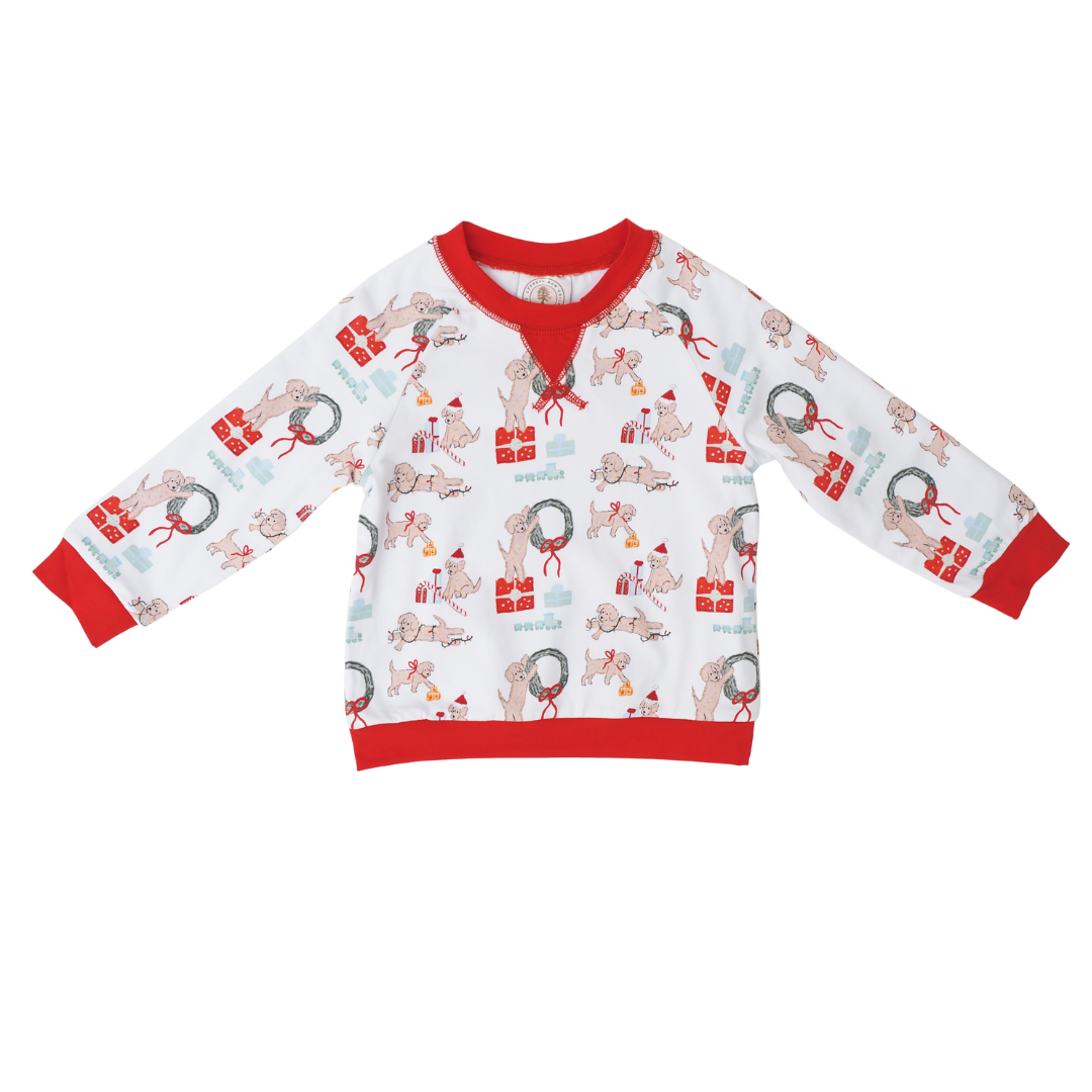 Children's long-sleeve shirt with Christmas-dog themed pattern on a white background