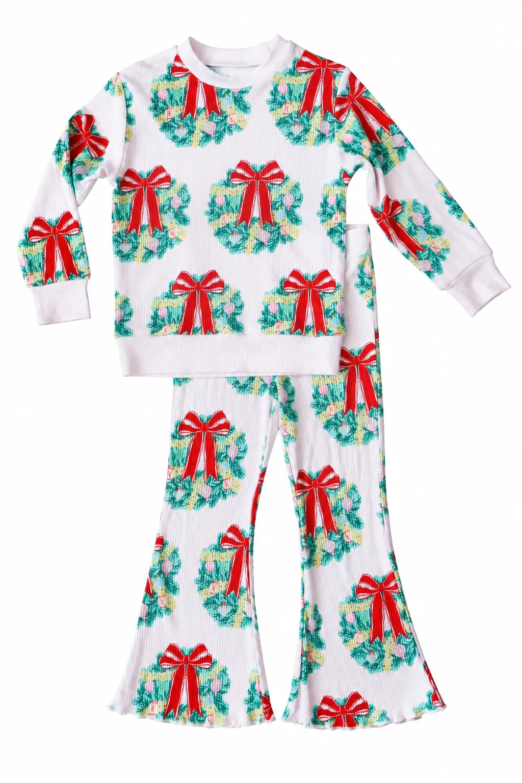 A two-piece children's longe set featuring a long-sleeve top and matching flared pants, printed with a festive Christmas wreath pattern on a white background. Each wreath is decorated with green foliage, yellow accents, and a red bow.