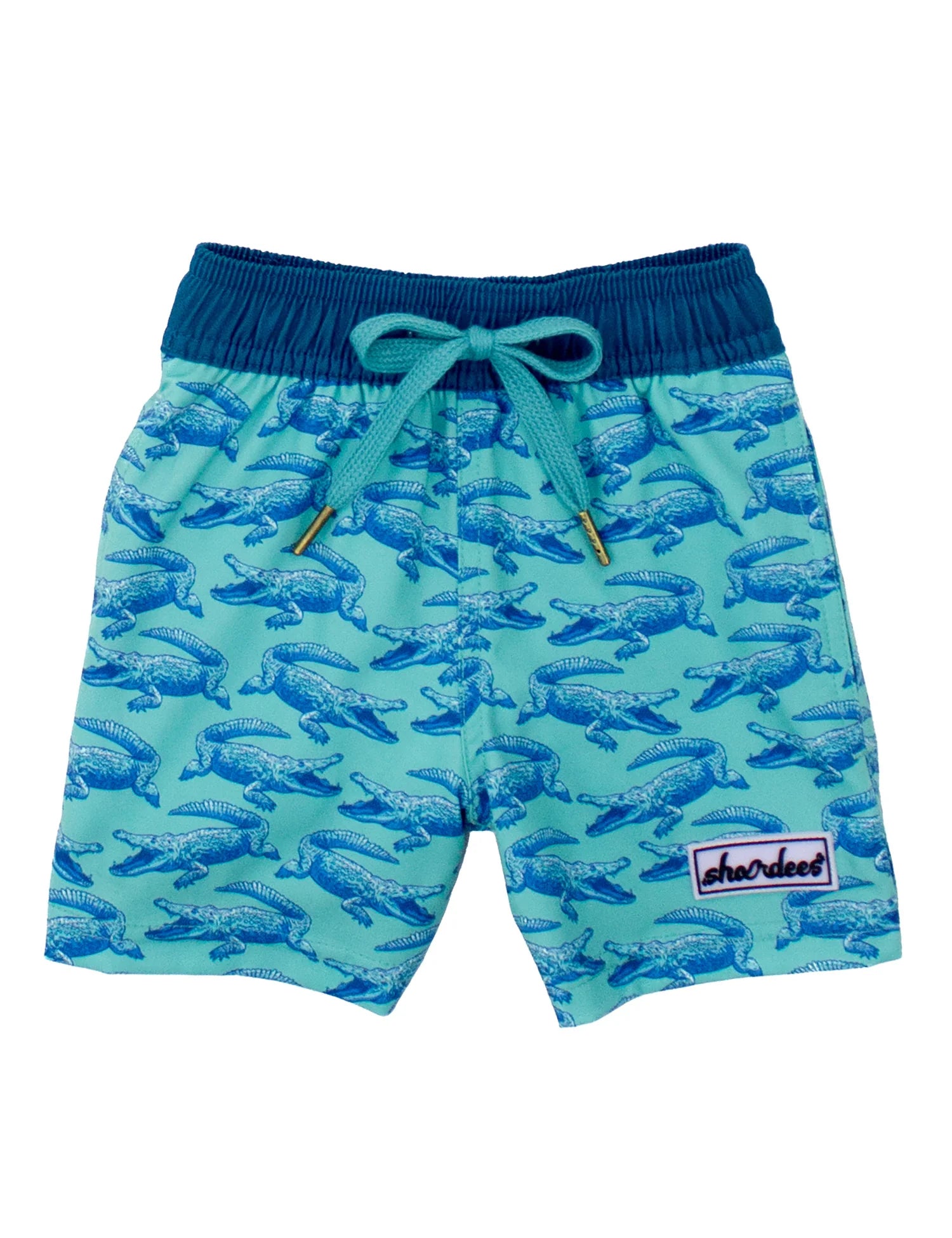 Green swim shorts with a blue elastic waistband and a blue alligator pattern.