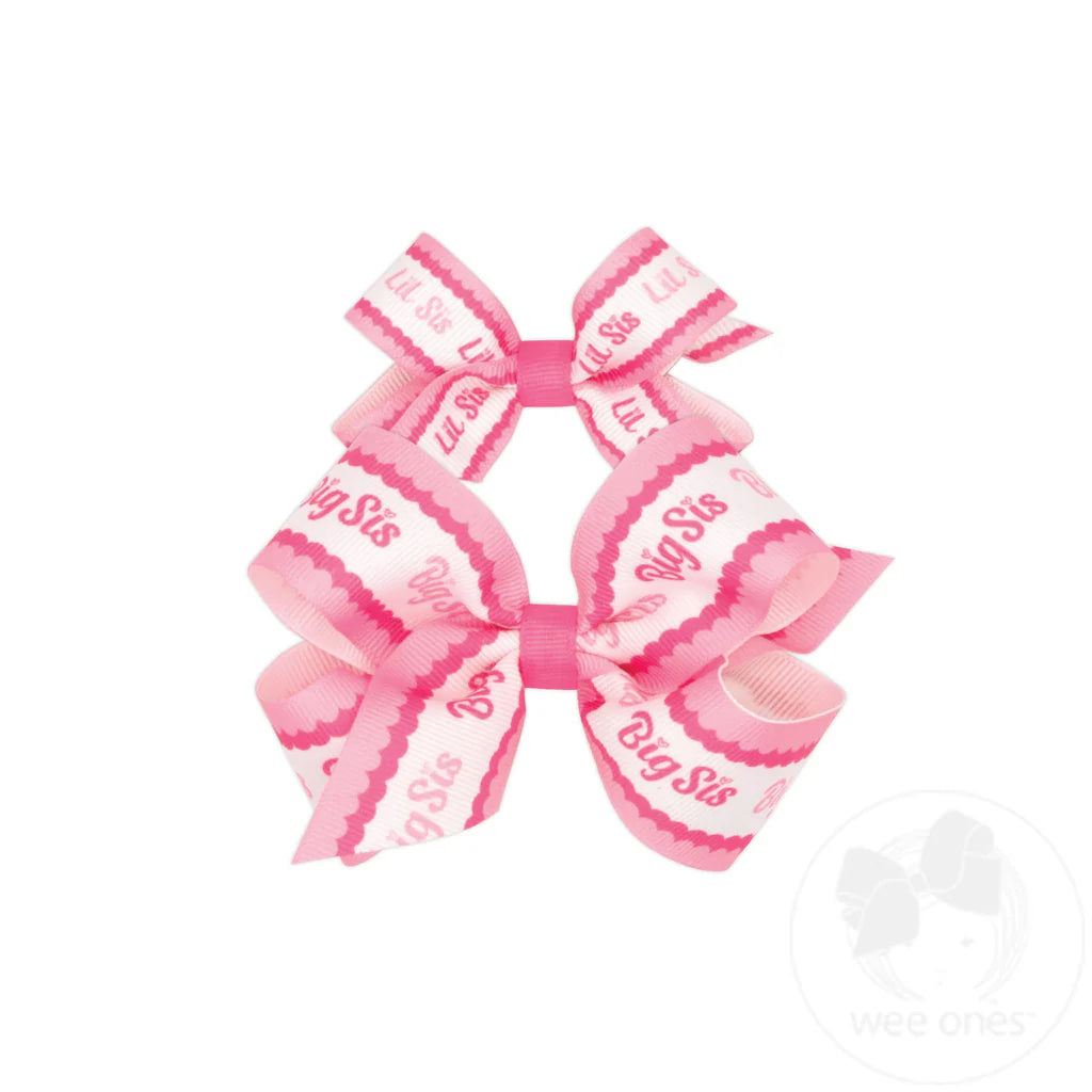 Pink hair bow set with 'Big Sis' text big bow and lil sis on smaller bow
