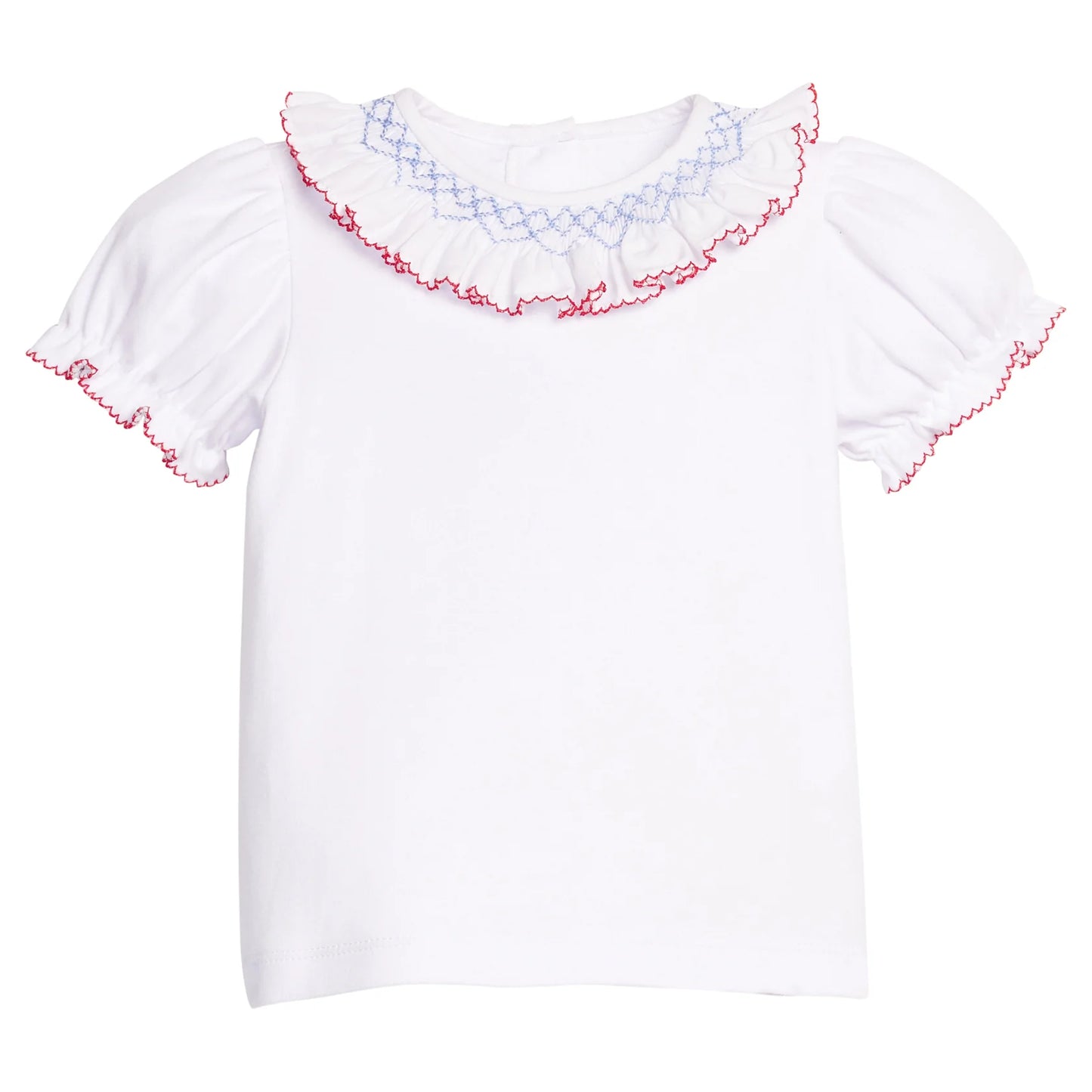 White blouse with smocked red and blue trim on a white background