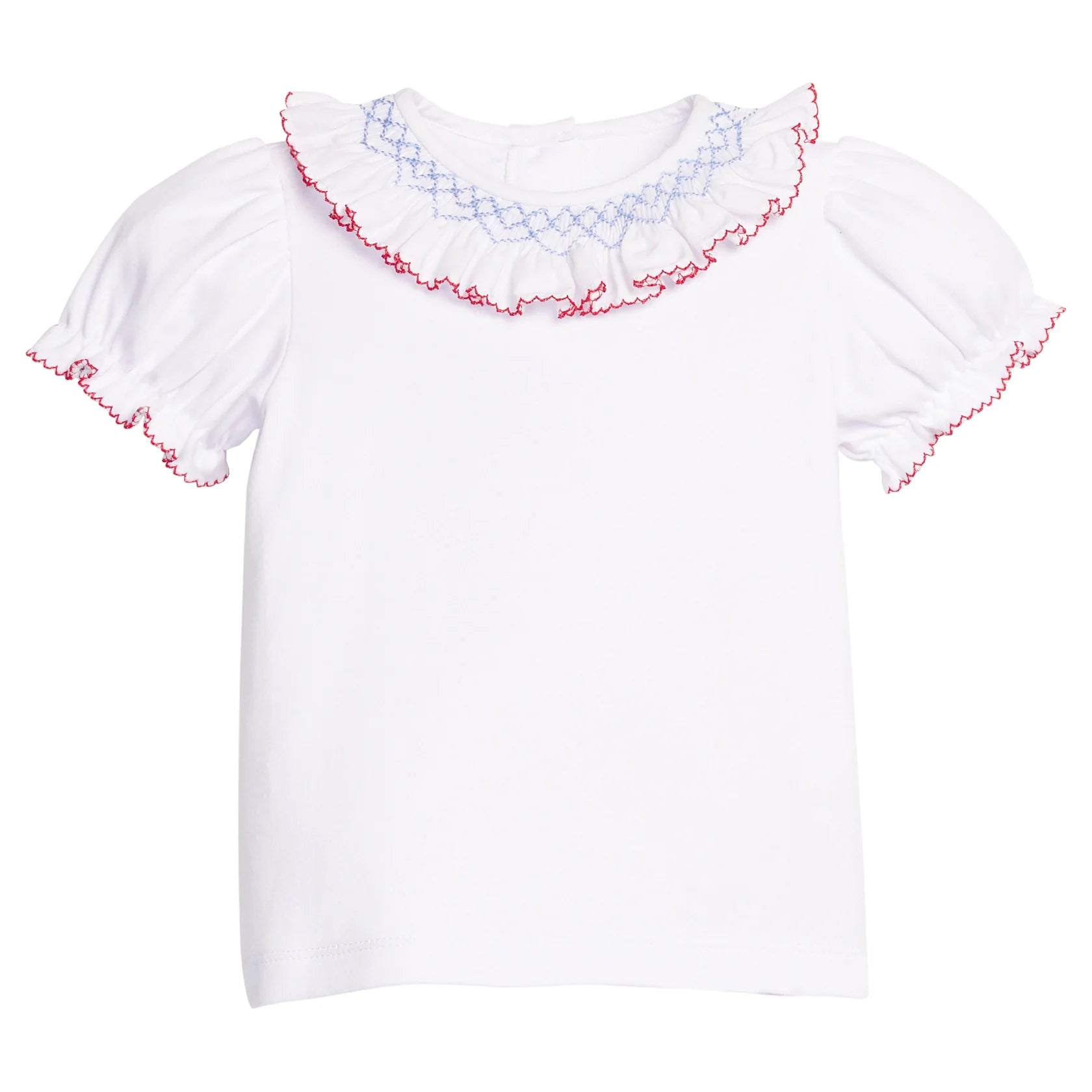 White blouse with smocked red and blue trim on a white background