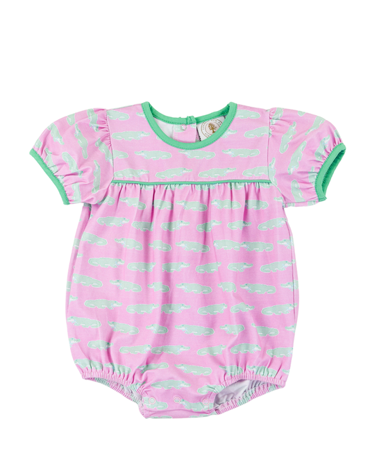 Pink and green baby girl bubble with alligator pattern. 