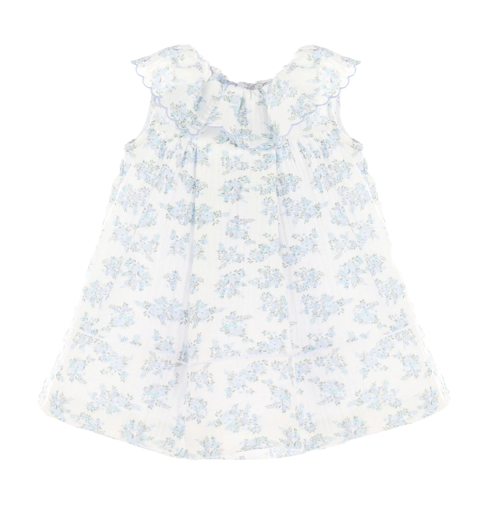 White dress with blue floral pattern on a white background