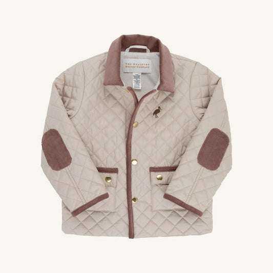 A quilted jacket in a light beige color with brown trim, brown elbow patches, and gold-tone buttons, shown flat on a light cream background.