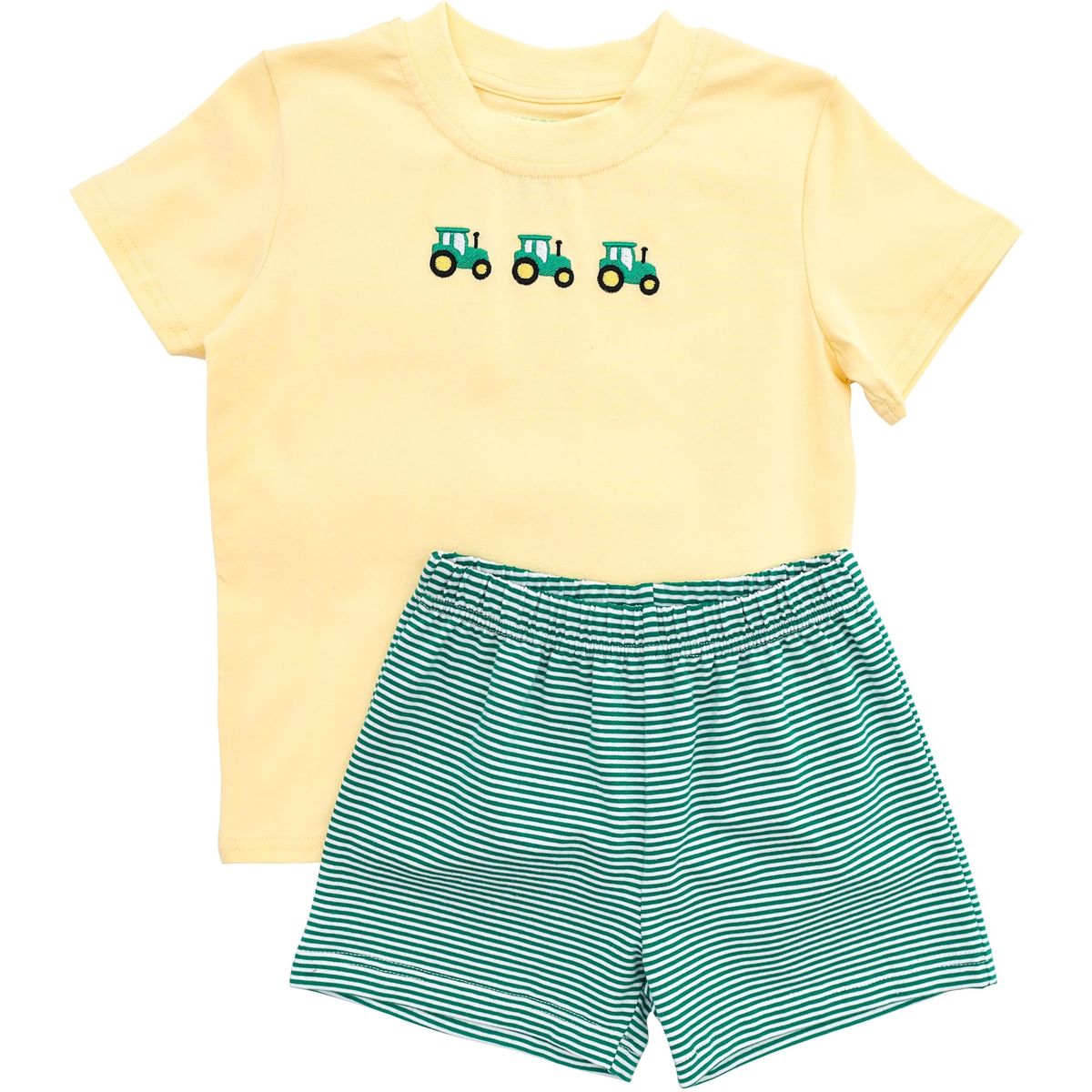 Yellow t-shirt with tractor design and green striped shorts 