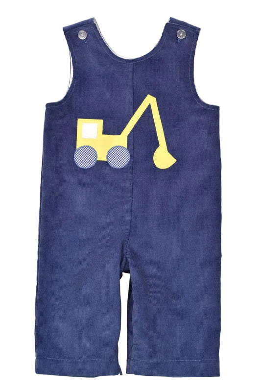 A baby's blue corduroy overall romper featuring a yellow excavator applique on the chest, displayed flat against a light off-white background.