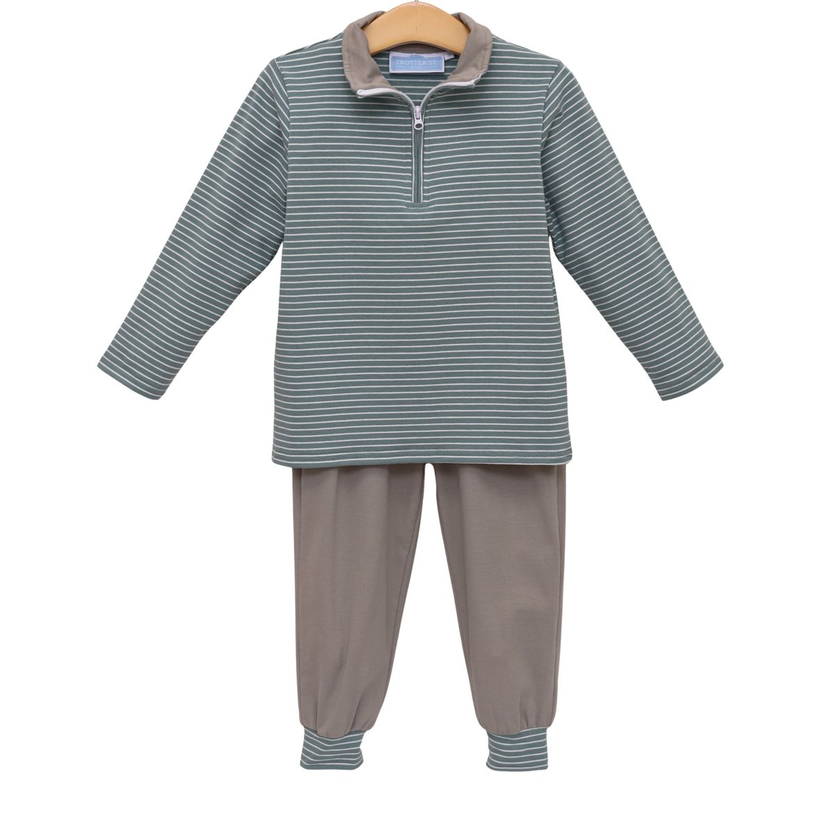 The set includes a long-sleeve quarter-zip pullover top with thin horizontal stripes in green and tan, and matching brown pants with striped cuffs.