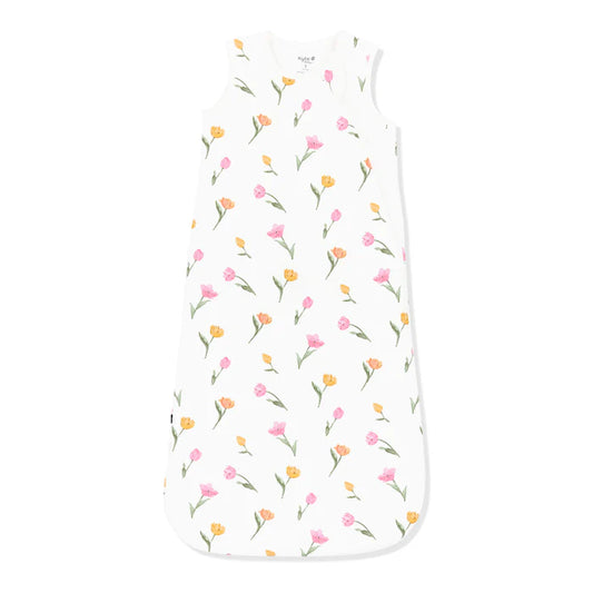 White sleep bag with pink and yellow tulip pattern.