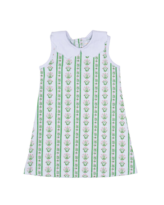 White dress with green/pink floral pattern with a white collar