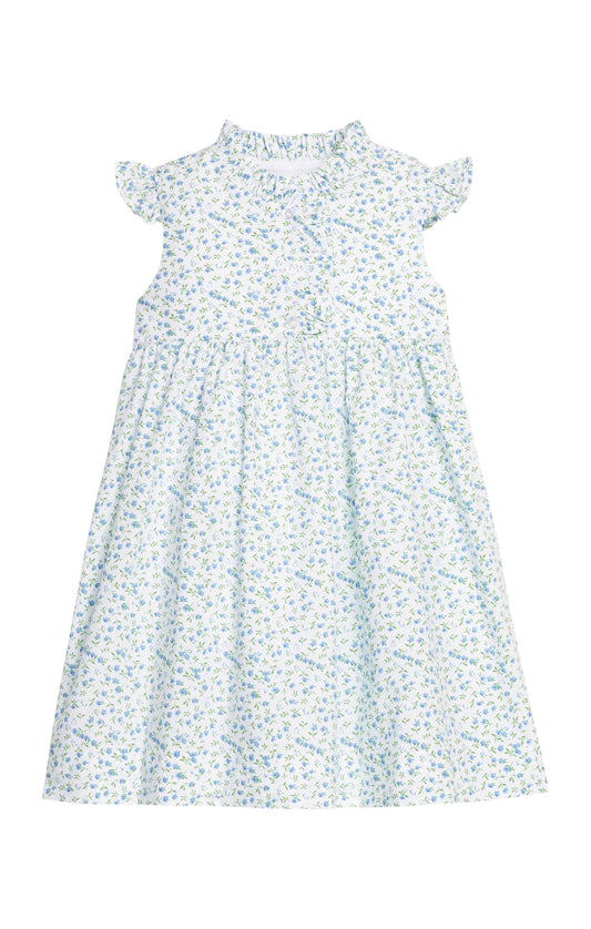 White dress with blue floral pattern on a white background