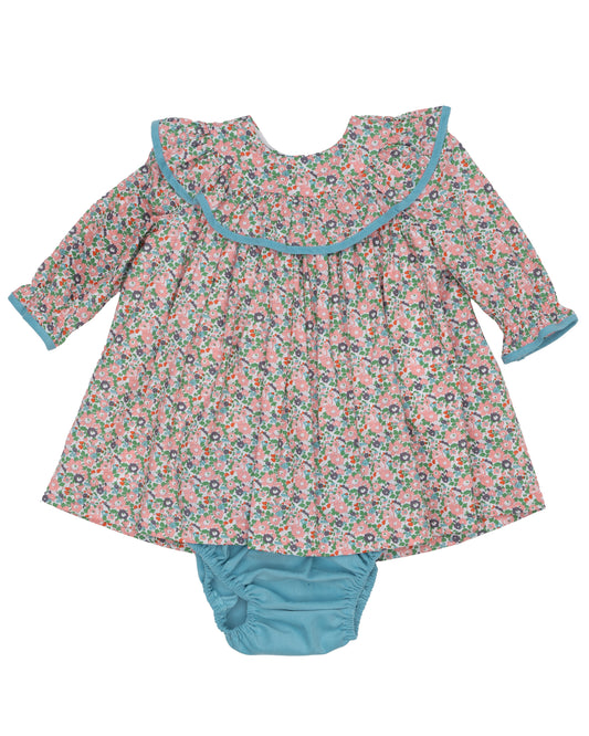 Floral long sleeve dress with blue trim and matching bloomers.