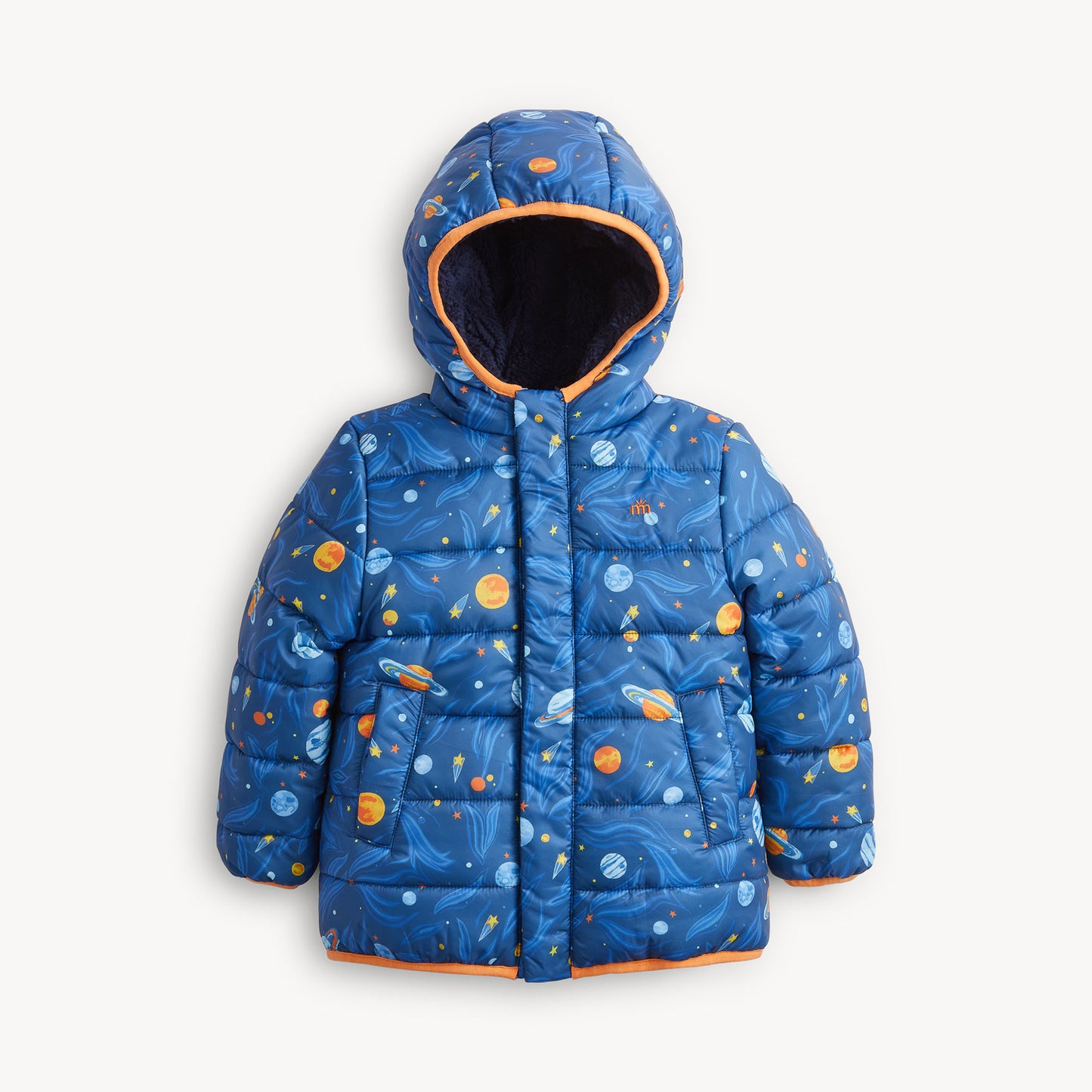 A blue hooded puffer jacket with an all-over space print featuring planets, stars, and nebulae, accented with orange trim on the hood lining and hem.