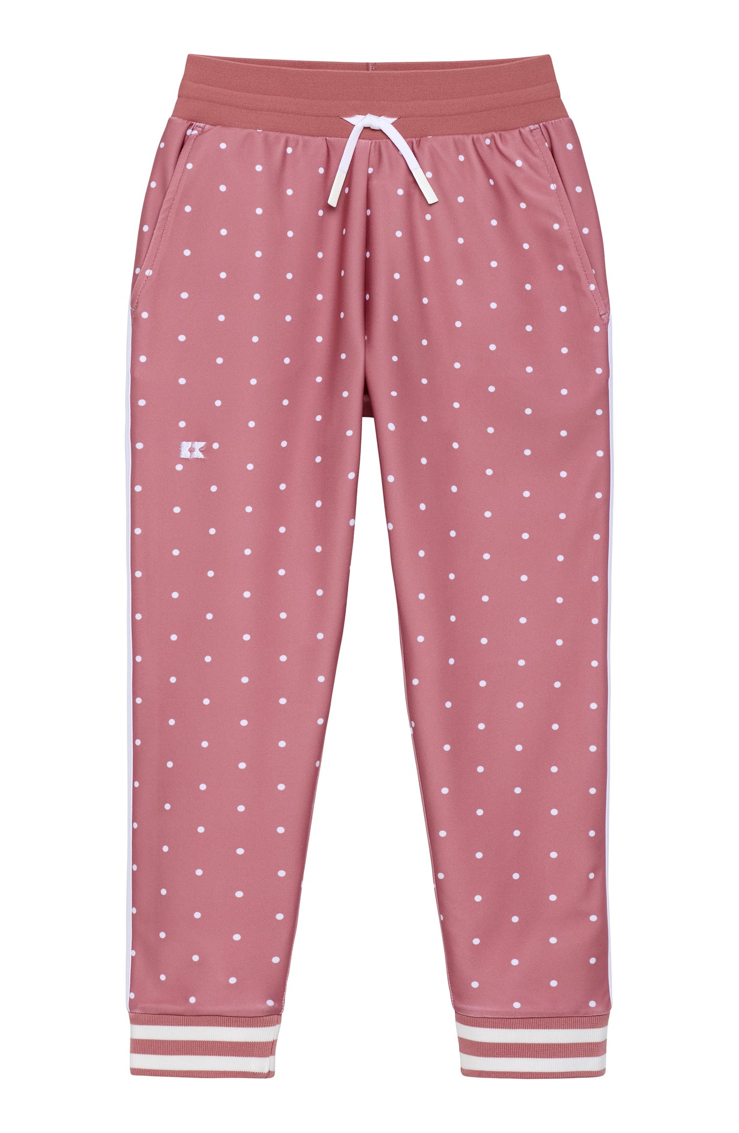 Pink jogger pants with a white polka dot pattern, featuring an elastic waistband with a white drawstring and striped cuffs.
