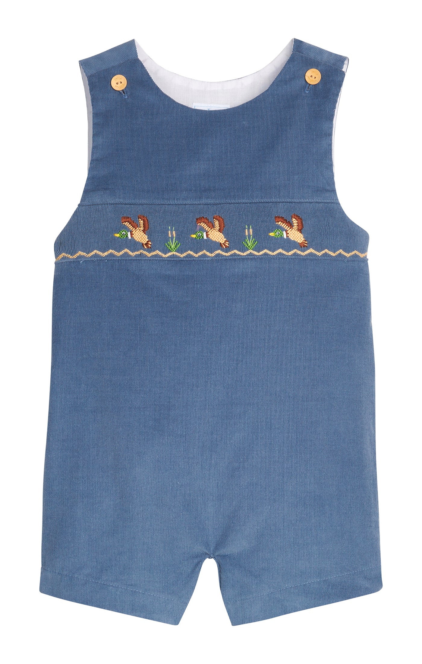 Blue children's overalls with smocked duck design  on a white background